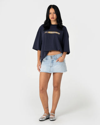 Man wearing Millennium Short Sleeve Tee in Dark Blue