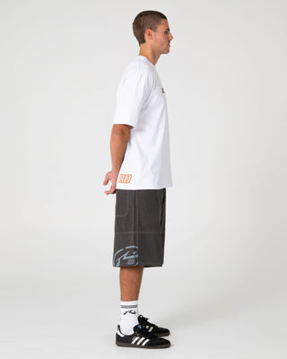 Man wearing Millennium Short Sleeve Tee in White