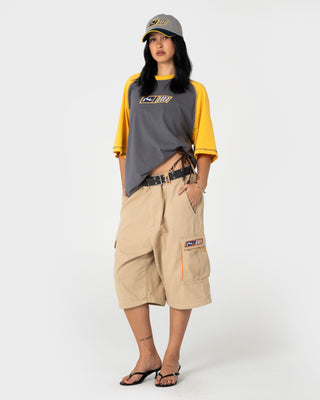 Man wearing Waka Raglan Short Sleeve Tee in Steel