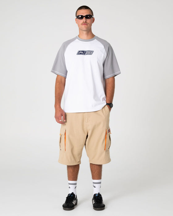 man-wearing-waka-raglan-short-sleeve-tee-in-white