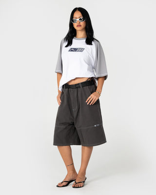 Man wearing Waka Raglan Short Sleeve Tee in White