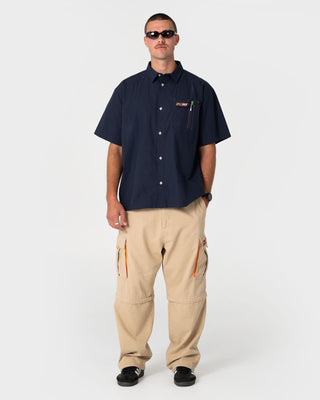 Man wearing Mosley Short Sleeve Shirt in Navy Blue