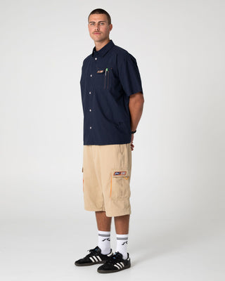 Man wearing Mosley Short Sleeve Shirt in Navy Blue