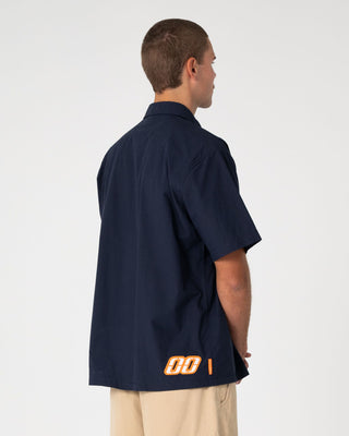 Man wearing Mosley Short Sleeve Shirt in Navy Blue