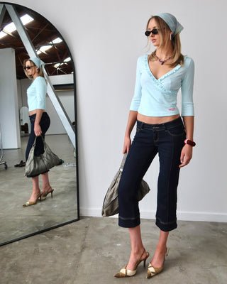 Woman wearing Naomi Deep Vee 3/4 Sleeve Top in Pale Mint