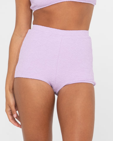 Woman wearing Sandalwood High Waisted Short in Muted Lavender