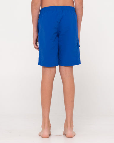 Boy wearing Offshore Cargo Boardshort Boys in Royal Blue