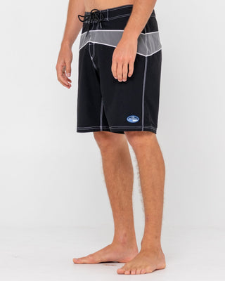 Man wearing Chop Suey Boardshort in Black / Grey