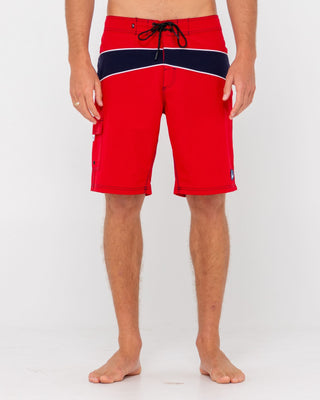 Man wearing Chop Suey Boardshort in True Red