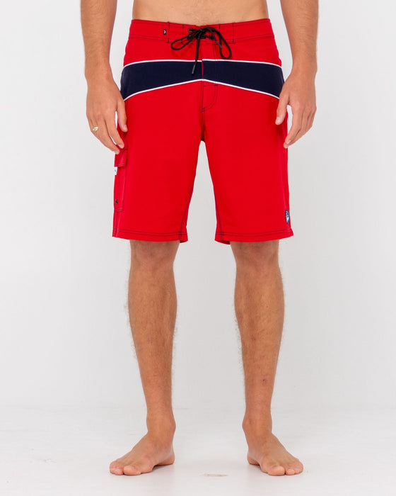 man-wearing-chop-suey-boardshort-in-true-red