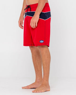 Man wearing Chop Suey Boardshort in True Red