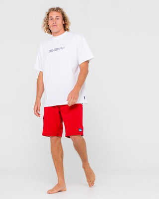 Man wearing Chop Suey Boardshort in True Red