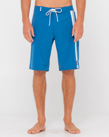 Man wearing Burnt Rubber Fitted Boardshort in Delft Blue