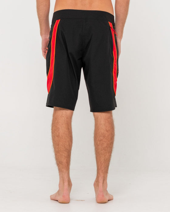 man-wearing-charger-boardshort-in-black
