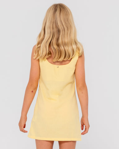 Girl wearing Meg Slip Dress Girls in Lemon Yellow