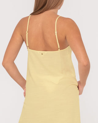 Woman wearing Sweet Water Mini Dress in Lemon Yellow