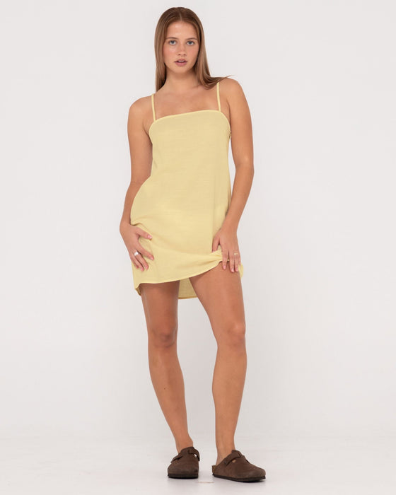 woman-wearing-sweet-water-mini-dress-in-lemon-yellow