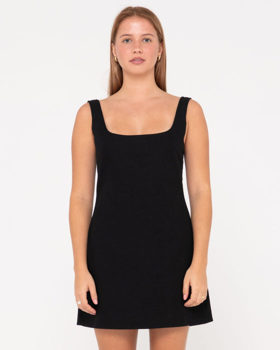 woman-wearing-meg-slip-dress-in-black
