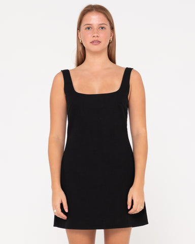 Woman wearing Meg Slip Dress in Black