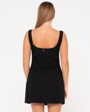 Woman wearing Meg Slip Dress in Black