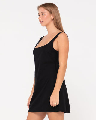 Woman wearing Meg Slip Dress in Black