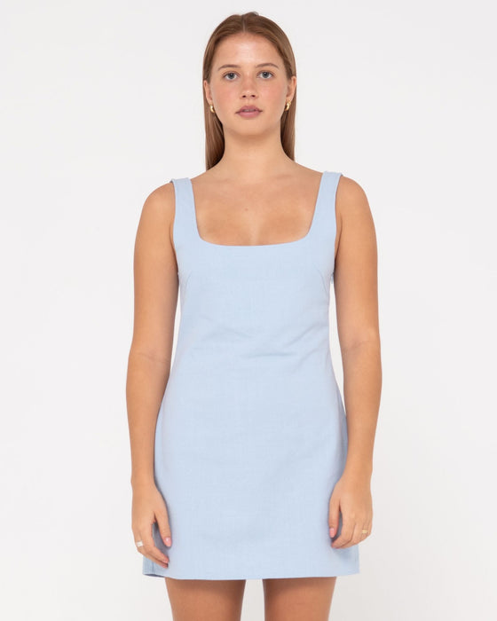 woman-wearing-meg-slip-dress-in-celestial-blue
