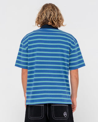 Man wearing Inspectah Deck Short Sleeve Polo in Delft Blue