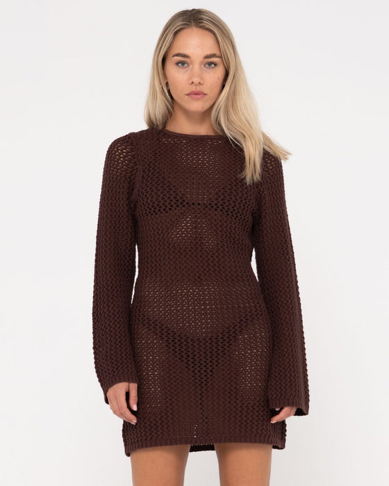 woman-wearing-amalfi-long-sleeve-knit-mini-dress-in-java