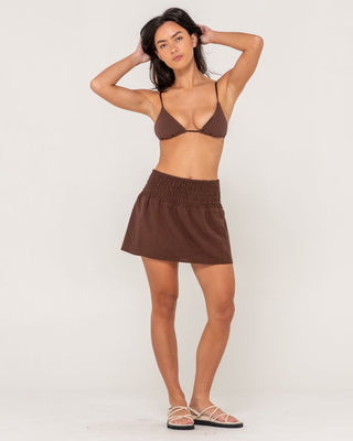 Woman wearing Palm Springs Shirred Mini Skirt in Java