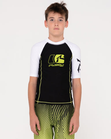 Boy wearing Y2shay Short Sleeve Surf Top Boys in Black / White