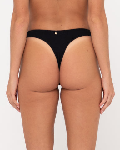 Woman wearing Sandalwood Brazilian Bikini Pant in Black