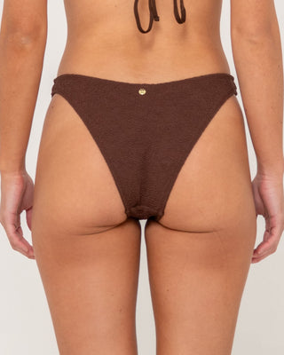 Woman wearing Sandalwood Midi Bikini Pant in Java