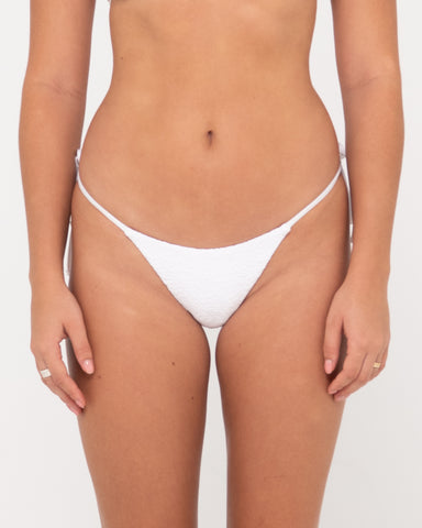 Woman wearing Sandalwood Midi Side Ties Bikini Pant in Bright White