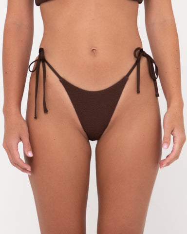 Woman wearing Sandalwood Midi Side Ties Bikini Pant in Java