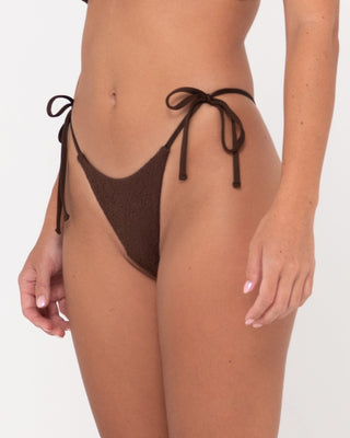 Woman wearing Sandalwood Midi Side Ties Bikini Pant in Java
