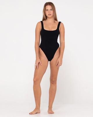 Woman wearing Sandalwood Retro One Piece in Black