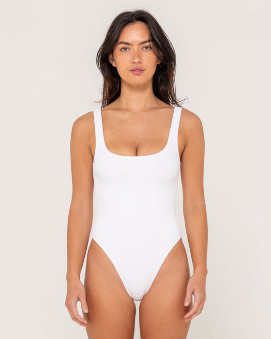 woman-wearing-sandalwood-retro-one-piece-in-bright-white