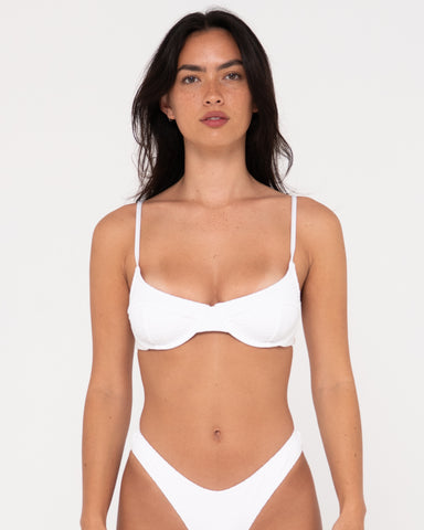 Woman wearing Sandalwood Balconette Bikini Top in Bright White