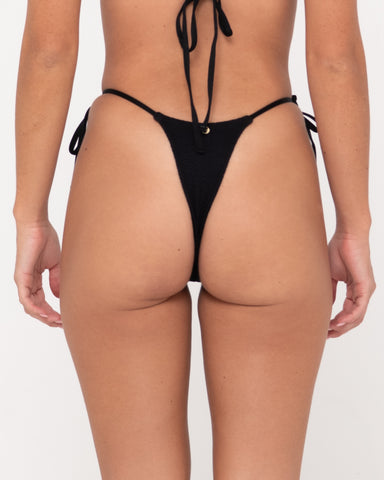 Woman wearing Sandalwood Brazilian Ties Bikini Pant in Black