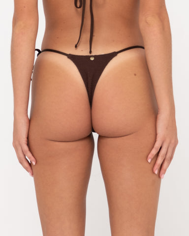 Woman wearing Sandalwood Brazilian Ties Bikini Pant in Java