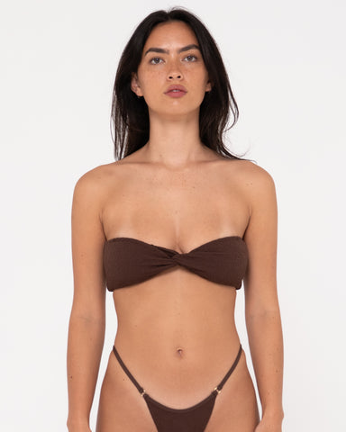 Woman wearing Sandalwood Twist Bandeau Bikini Top in Java