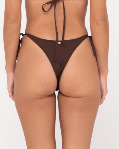 Woman wearing Cabana Brazilian Side Tie Bikini Pant in Java