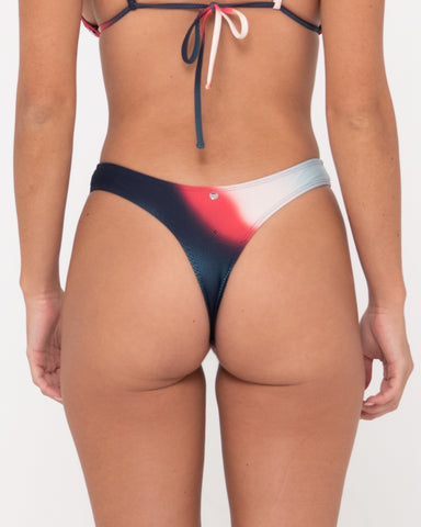 Woman wearing Meshy Bikini Pant in True Red