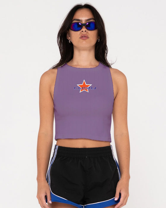 woman-wearing-starry-eyed-skimmer-tank-in-purple-nights