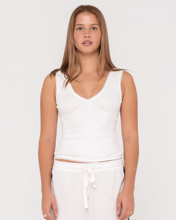 woman-wearing-lacey-vee-neck-tank-in-white