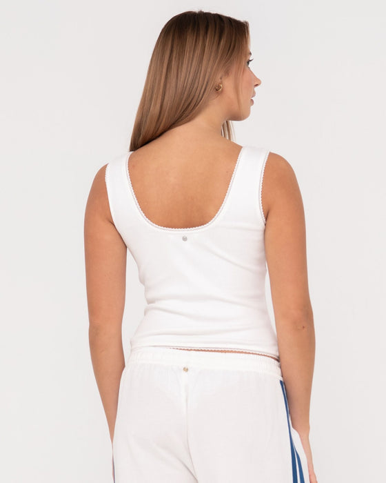 woman-wearing-lacey-vee-neck-tank-in-white