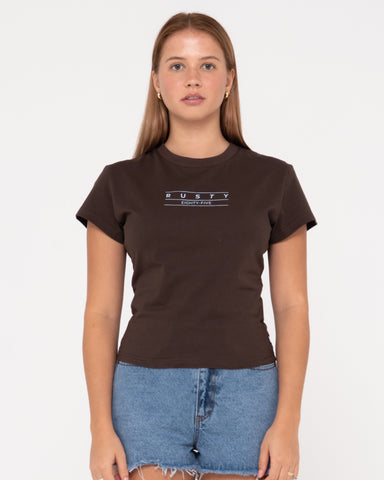 Woman wearing Rusty Essentials Skimmer Baby Tee in Java