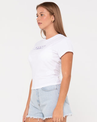 Woman wearing Rusty Essentials Skimmer Baby Tee in White