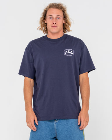 Man wearing Advocate Short Sleeve Tee in Navy Blue 2