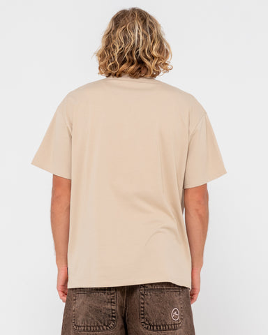 Man wearing V8 Short Sleeve Tee in Light Khaki